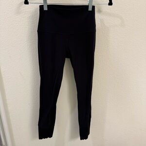 Lululemon Athletica Black High-Rise Leggings with Cutout Design | Size 4